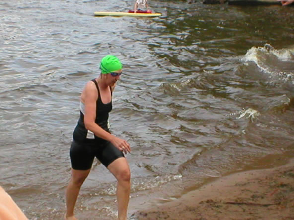 Mom leaving the water after her swim